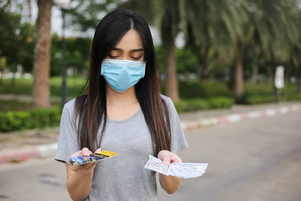 Asian Woman Wearing Face Protection Virus Mask Holding Money Credit — Stock Photo, Image