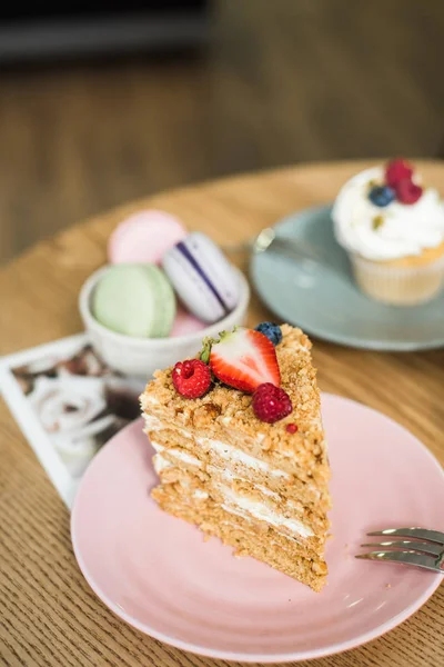 Delicious piece of cake on a plate in a cafe