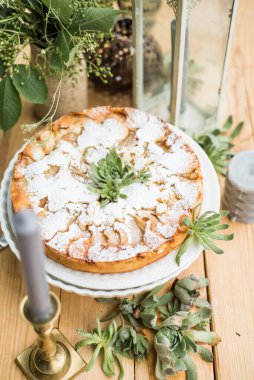 Mint decorated apple pie. Picnic in the style of boho.