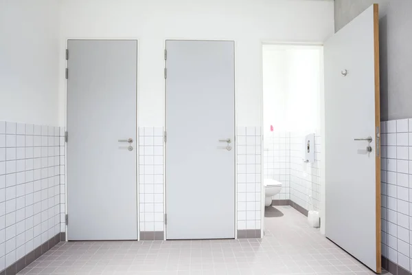 Public toilet for men and shower — Stock Photo, Image
