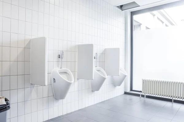 Urinal on the wall — Stock Photo, Image