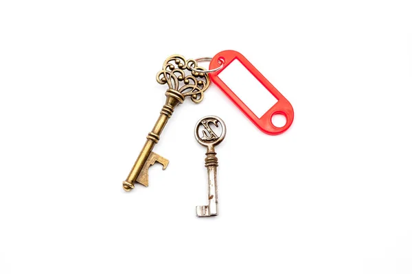 Uma chave antiga com rótulo — Fotografia de Stock