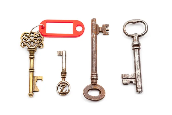 Una llave antigua con etiqueta —  Fotos de Stock