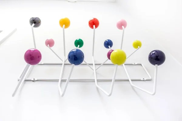 Coat rack with balls — Stock Photo, Image
