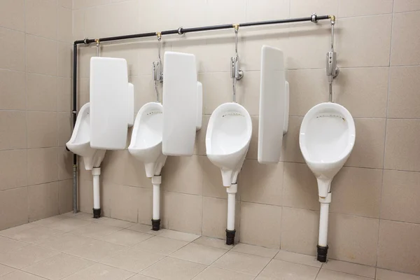 Urinal on the wall — Stock Photo, Image