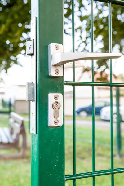 The secutity locks in an iron fences