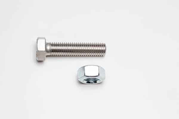 One lying bolt and one nut — Stock Photo, Image