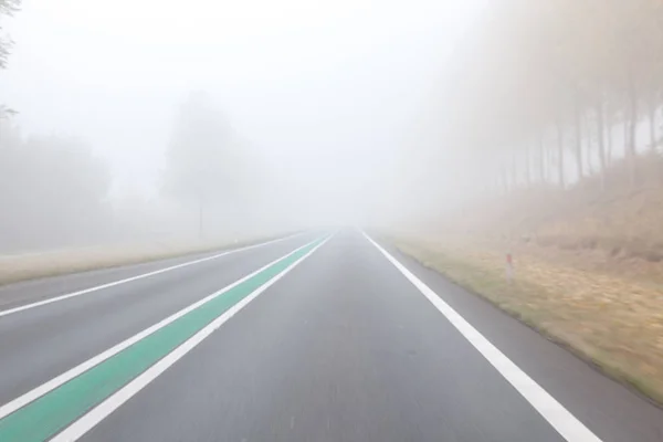 driving on a foggy road