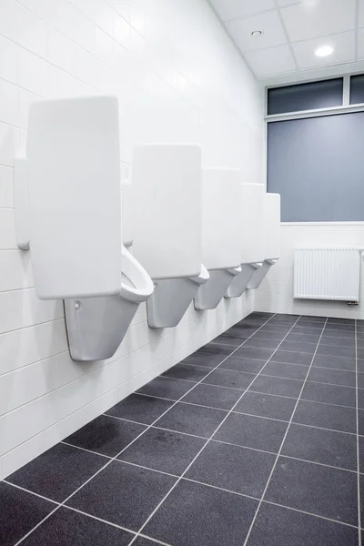 Urinal on the wall — Stock Photo, Image