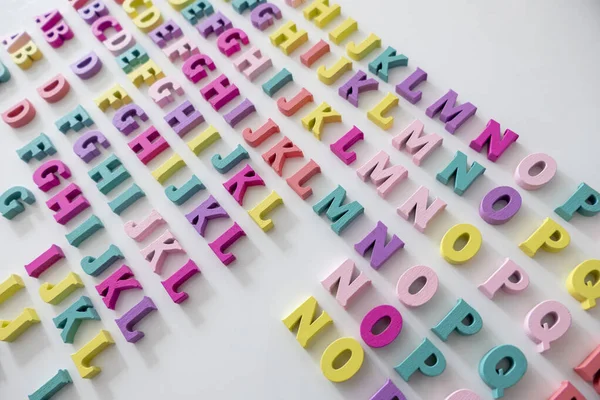 Plenty Colorful Wooden Letters White Background — Stock Photo, Image