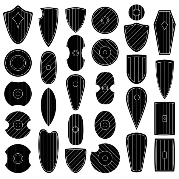 Set of monochrome images of medieval shields and bucklers. — Stock Vector