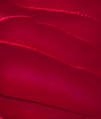 Kırmızı kozmetik doku arka planı, makyaj ve cilt estetiği 