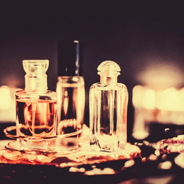 Perfume bottles and vintage fragrance at night, aroma scent, fra Royalty Free Stock Photos
