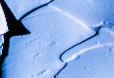 Mavi kozmetik doku arka plan, makyaj ve cilt estetiği