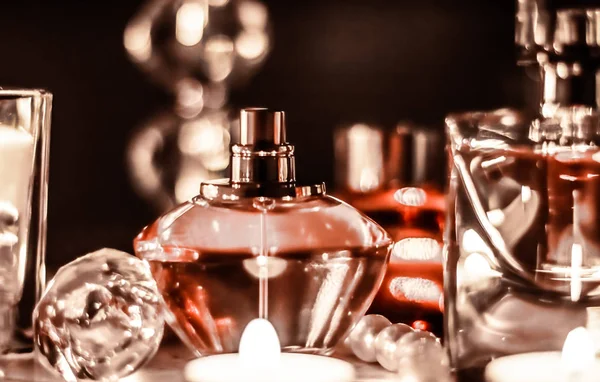 Perfume bottle and vintage fragrance on glamour vanity table at — Stock Photo, Image