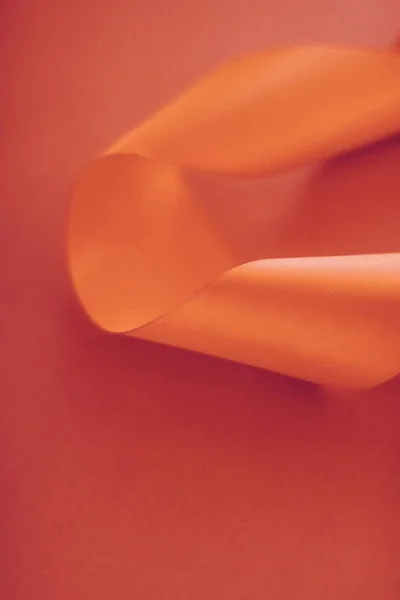 Astratto nastro di seta riccia su sfondo arancione, esclusivo luxur — Foto Stock