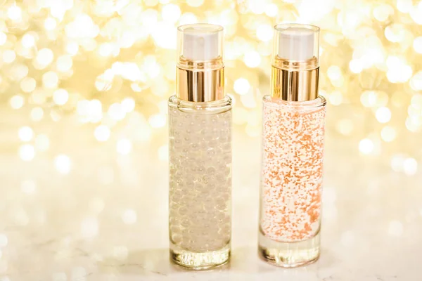 Holiday make-up base gel, serum emulsion, lotion bottle and gold