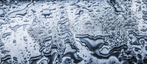 Textura de agua fondo abstracto, gotas de agua sobre vidrio plateado como —  Fotos de Stock