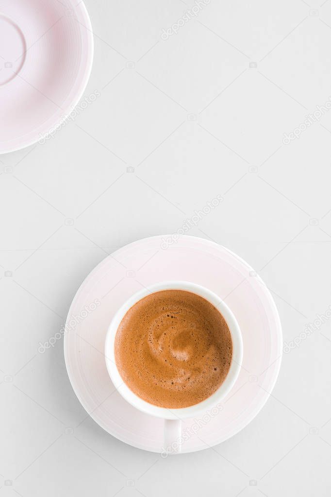 Cup of hot french coffee as breakfast drink, flatlay cups on whi