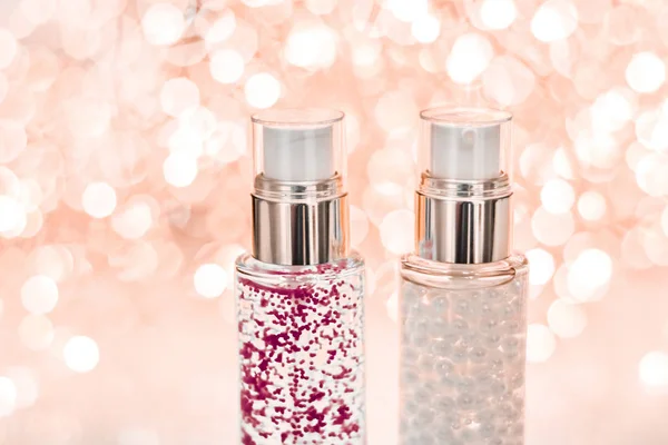 Holiday make-up base gel, serum emulsion, lotion bottle and rose