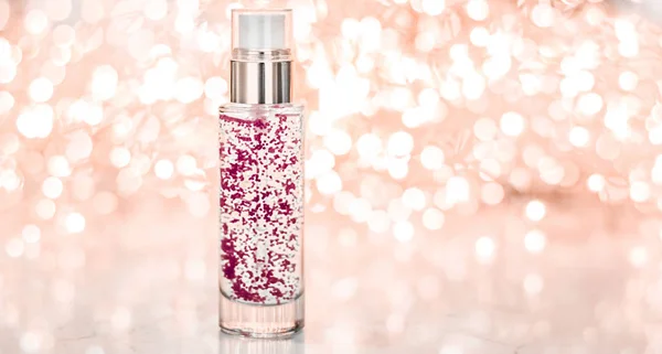 Holiday make-up base gel, serum emulsion, lotion bottle and rose