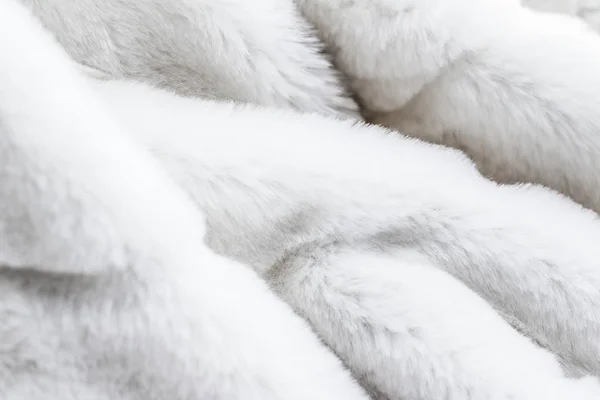 Luxury white fur coat texture background, artificial fabric deta