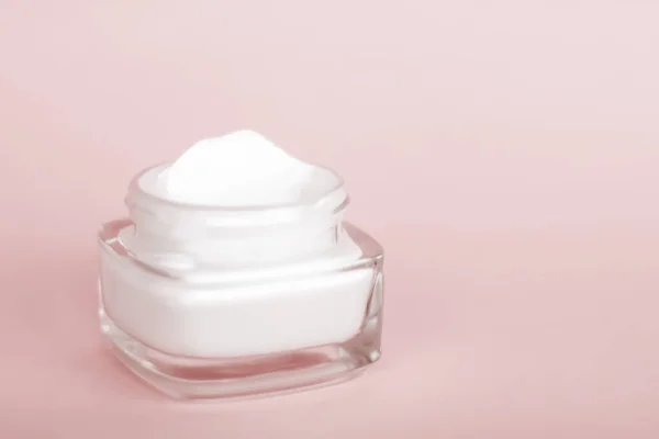 Face cream moisturizer jar on beige background, moisturizing ski — Stock Photo, Image