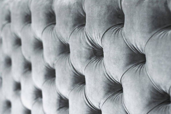 Silver luxury velour quilted sofa upholstery with buttons, elega