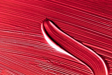 Kozmetik soyut doku arka planı, kırmızı akrilik boya fırçası