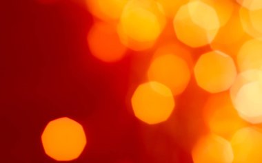 Kırmızı soyut arkaplanda göz kamaştırıcı altın parıltı, Chris.