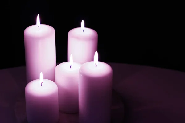 Aromatic purple floral candles set at night, Christmas, New Year — Stock Photo, Image