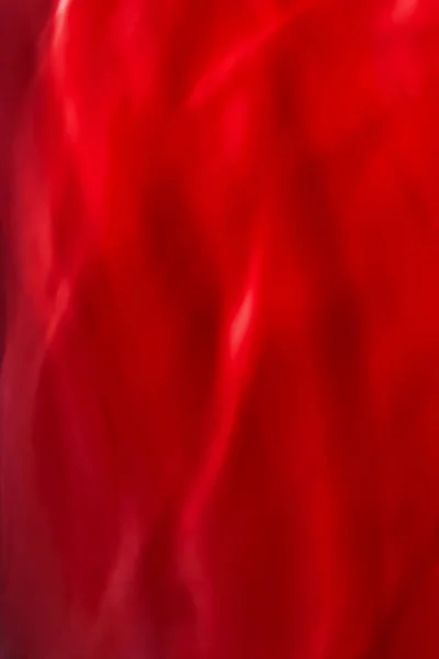 Red abstract art background, silk texture and wave lines in moti — Stock Photo, Image