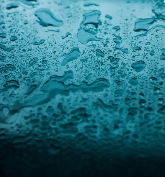 Textura de agua fondo abstracto, gotas de agua sobre vidrio turquesa —  Fotos de Stock