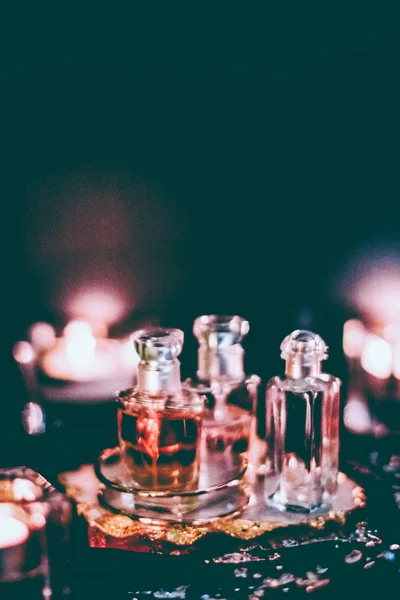 Perfume bottles and vintage fragrance at night, aroma scent, fra — Stock Photo, Image