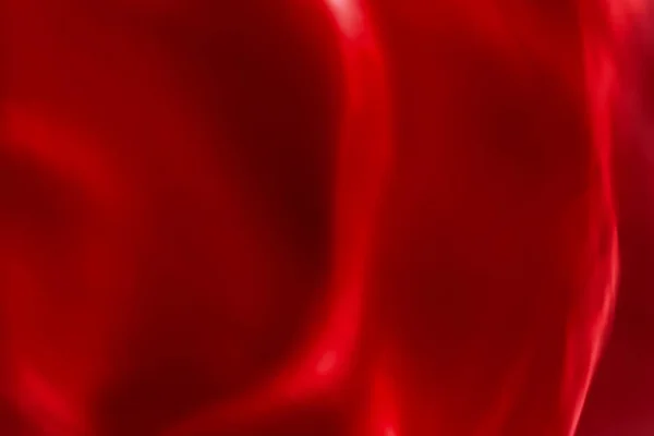 Fondo de arte abstracto rojo, textura de seda y líneas onduladas en moti — Foto de Stock