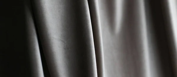 Abstraktní šedá tkanina pozadí, sametový textilní materiál pro bli — Stock fotografie