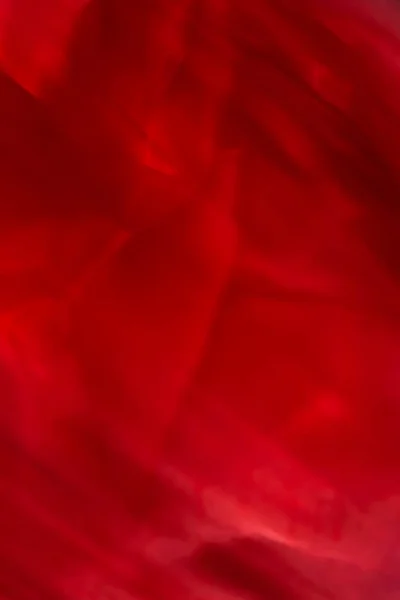 Red abstract art background, silk texture and wave lines in moti — Stock Photo, Image