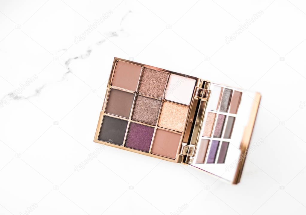 Eye shadow palette on marble background, make-up and cosmetics p