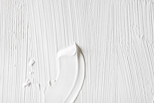 Cosméticos fundo textura abstrata, branco pincel tinta acrílica — Fotografia de Stock