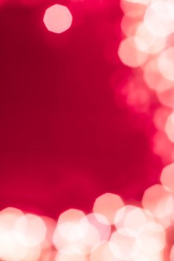 Pembe soyut arka planda göz kamaştırıcı beyaz parıltı, Chris.