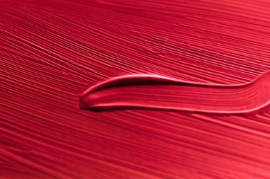 Kozmetik soyut doku arka planı, kırmızı akrilik boya fırçası