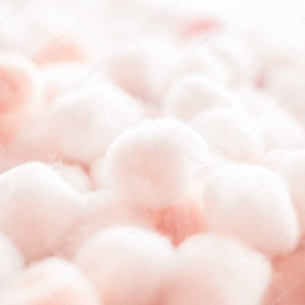 Organic cotton balls background for morning routine, spa cosmeti