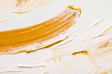 Sanatsal soyut doku arka planı, altın akrilik boya fırçası