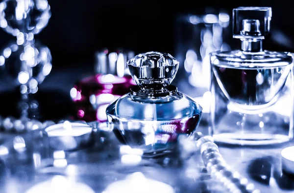 Perfume bottle and vintage fragrance on glamour vanity table at — Stock Photo, Image