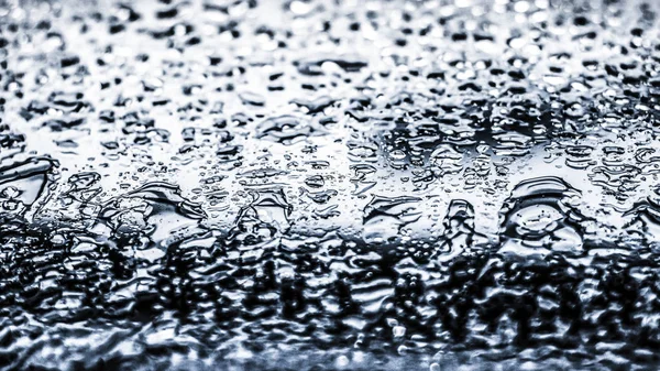 Textura da água fundo abstrato, gotas de água em vidro de prata como — Fotografia de Stock