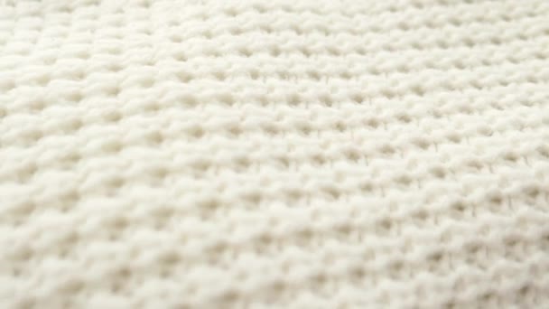 Warm knitted clothes, soft and white — Stock Video
