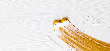 Sanatsal soyut doku arka planı, altın akrilik boya fırçası