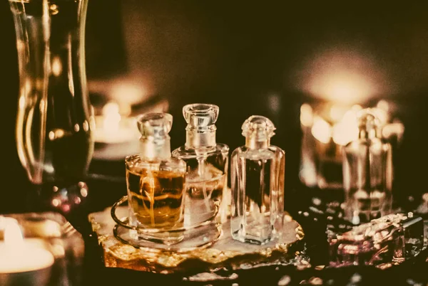 Perfume bottles and vintage fragrance at night, aroma scent, fra — Stock Photo, Image