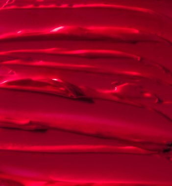 Kırmızı kozmetik doku arka planı, makyaj ve cilt estetiği 