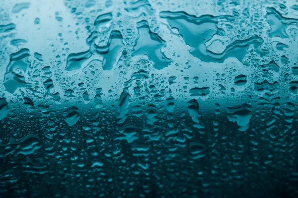 Textura de agua fondo abstracto, gotas de agua sobre vidrio turquesa —  Fotos de Stock